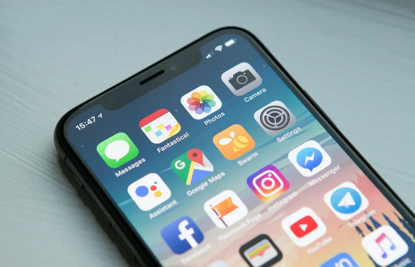 A smartphone home screen full of mobile apps